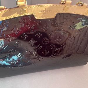 Stunning chocolate/ deep eggplant patent Louis Vuitton bag. Certified authentic.